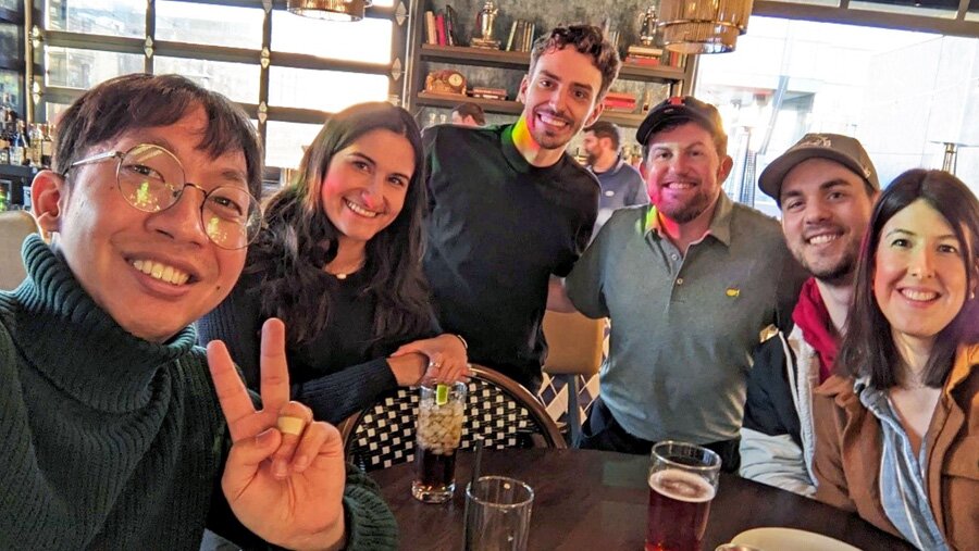 a group of smiling colleagues